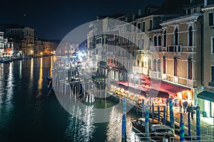 Venice`s Grand Canal under a clear sky at night