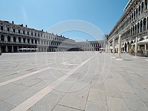 Venice, San Marco, Italy - July 2020. Tourist are slowly back in deserted Venice  Saint Marcus square after covid-19 outbreak city