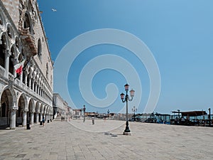 Venice, San Marco, Italy - July 2020. Tourist are slowly back in deserted Venice  Saint Marcus square after covid-19 outbreak city