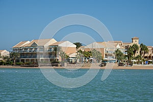 Venice Sands, Egypt. November 20 2018 Luxury villa by the sea with palm trees and a beach