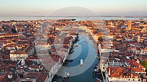 Venice sunrise skyline, aerial view of the Grand Canal, gondolas, Italy