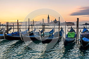 Venice sunrise and Venice gondolas on San Marco square at sunrise, Grand Canal, Venice, Italy