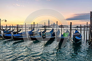 Venice sunrise and Venice gondolas on San Marco square at sunrise, Grand Canal, Venice, Italy