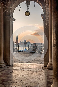 Venice sunrise and Venice gondolas on San Marco square at sunrise, Grand Canal, Venice, Italy