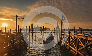 Venice sunrise and Venice gondolas on San Marco square at sunrise, Grand Canal, Venice, Italy