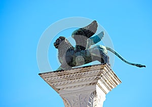 Venice, VE, Italy - February 13, 2024: Winged Lion symbol of the Serenissima Republic of Venice and the sky in Saint Mark Square