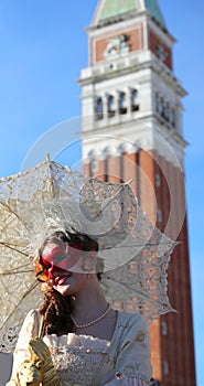 Venice, VE, Italy - February 13, 2024: beautiful smiling masquerade girl