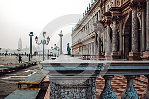 Venice, view of Piazza San Marco, a lot of tourists, fog