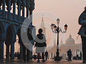 Venice, view of Piazza San Marco, a lot of tourists, fog