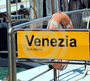 Venice written in the ferry boat stopper in italy