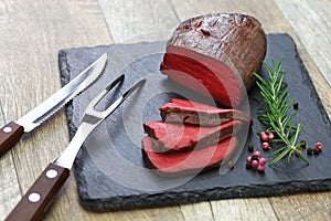 Venison steak, sous vide cooking photo