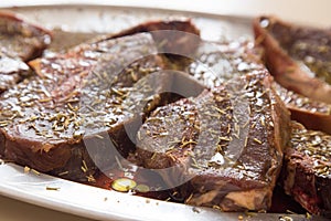 Venison steaks marinating