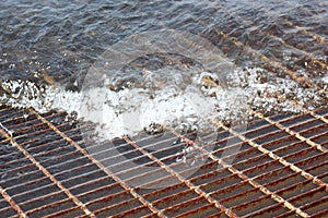 Vent grid flooded with water