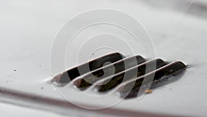 Vent hole with steam on the sheet metal Closeup view.