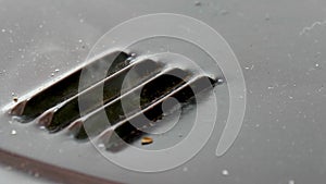 Vent hole with steam on the sheet metal Closeup view.