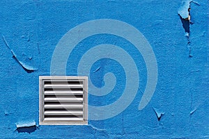 Vent on Old Blue Concrete Wall