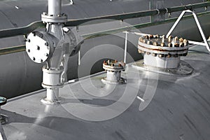 vent valves over pressure canisters for gas storage in industrial refinery