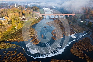 Venta Rapid waterfall, the widest waterfall in Europe and long brick bridge, Kuldiga, Latvia.