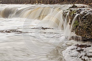 Venta waterfall, the widest waterfall in Europe, in winter day, Kuldiga, Latvia.