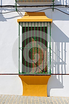 Ventana con reja en  Castilblanco de los Arroyos, provincia de Sevilla, AndalucÃÂ­a, EspaÃÂ±a photo