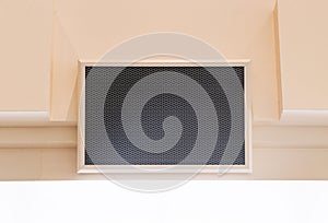 Ventilation air vents are attached to cream color beams of structure ( honeycomb vents). Building or under ceiling wall.
