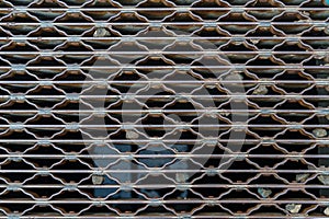 A ventilation grate that also serves as a sewer grate on the streets of Manhattan