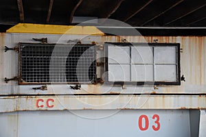 Ventilation opening in hatch covers of the merchant cargo vessel