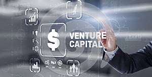 Venture capital. Investor capital. Businessman pressing virtual screen inscription