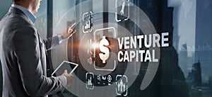 Venture capital. Investor capital. Businessman pressing virtual screen inscription