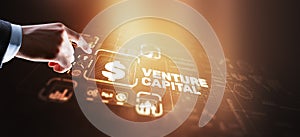 Venture capital. Investor capital. Businessman pressing virtual screen inscription