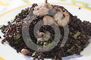 Venus black rice with prawns and courgettes photo