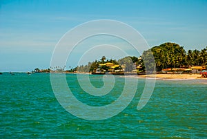 Vera Cruz, island Itaparica, Bahia, Brazil: Beautiful island with palm trees and a beach near the city of Salvador photo