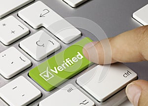 Verified - Inscription on Green Keyboard Key