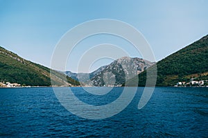 Verige Strait in Kotor Bay, Montenegro, against the backdrop of the city of Perast.