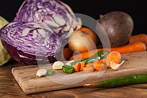 Verious fresh vegetables on a wooden table, healthy food