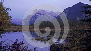Vermilion Lakes and Mount Rundle autumn foliage scenery in sunset time. Banff National Park, Canadian Rockies