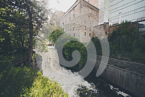 Vermillion Falls, an urban waterfall next to an old factory located in Hastings, Minnesota photo