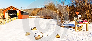 Vermont`s Paper Mill Covered Bridge in Winter snow photo