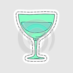 Vermouth glassware as a sticker. Cartoon sketch graphic design. Doodle style. Colored hand drawn image. Party drink concept for