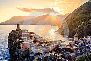 Vernazza - Village of Cinque Terre National Park at Coast of Italy. Beautiful colors at sunset. Province of La Spezia, Liguria, in