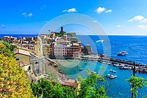 Vernazza - Village of Cinque Terre National Park at Coast of Italy. Beautiful colors at sunset. Province of La Spezia, Liguria, in photo