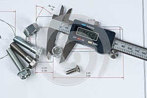 Vernier caliper and assorted screw, nuts and bolts