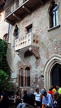 The famous House of Juliet with its balcony in a small courtyard in the city of Verona Italy is always full of tourists