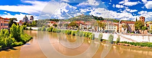 Verona cityscape from Adige river bridge panoramic view