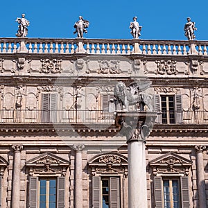 Verona, Italy - 06 May 2018: Verona historic city center - Palazzo Maffei palace and the Venecian Lion statue on the