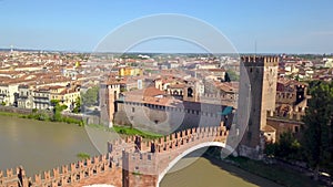 Verona, Italy: Aerial view of Castelvecchio Bridge Ponte di Castelvecchio and Castelvecchio Castle. Flying over historic city