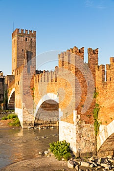 Verona, Italy. Castelvecchio bridge on Adige river. Old castle sightseeing at sunrise