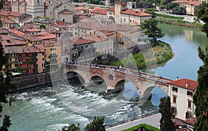 Verona in Italy and old Stone Bridge called PONTE PIETRA over Adige River