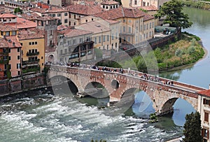 Verona in Italy and old Stone Bridge called PONTE PIETRA over Adige River