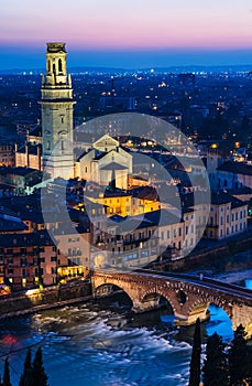 Verona night view with Ponte Pietra and Duomo photo